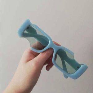 Tinted holes cutout sunglasses